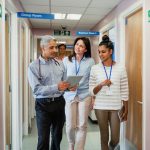 group-of-doctors-walking-in-a-clinic-hallway-e1576116486200-150×150